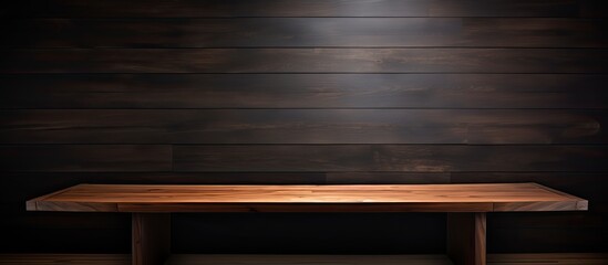 Aufkleber - There is a contemporary wooden table positioned near a black wall providing ample space for adding images or text