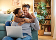 © Lumos sp - laptop man woman computer technology home couple young together happy happiness smiling togetherness male internet online wife love