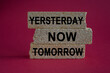 © Liudmila - Yesterday, now, tomorrow on brick blocks. Beautiful red background. Motivational Quote concept symbolizing that yesterday and tomorrow are not as important as now. Copy space.