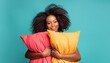 © Amli - Women with bright pillows on blue background