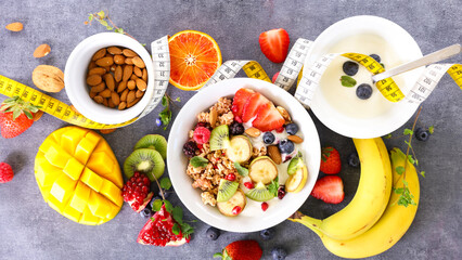 Wall Mural - bowl of muesli with fresh fruits- health food concept