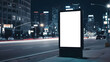 © organik - Blank vertical space billboard, blank white signboard on roadside in city, vertical isolated billboard in city at night time, white signboard or light box on roadside for advertising placement