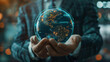 © antkevyv - Businessman holding glowing globe in hands global business technology, worker earth