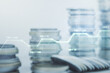 © Pixels Hunter - Multi exposure of stats data illustration on stacks of coins background, computing and analytics concept