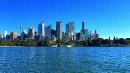 Wall Mural - Sunday 9 June 2024 Sydney Harbour CBD Australia buildings office and residential apartments lining the coast