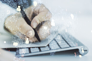 Wall Mural - double exposure of social network icons concept with world map and hand writing in notepad on backgr