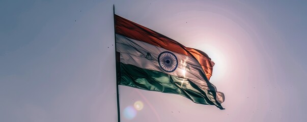 Wall Mural - India flag with a sunny sky background