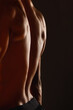 © K Davis/peopleimages.com - Back, fitness and man with muscles in studio for workout, sports and wellness or training. Bodybuilder, athlete and sportsman with progress, results and spine by black background for aesthetics
