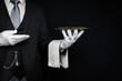 © jeremyimagery.com - Portrait of Butler or Waiter in Dark Suit and White Gloves Holding Serving Tray. Professional Courtesy and Service Industry.