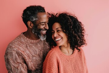 Wall Mural - Portrait of a joyful mixed race couple in their 50s wearing a cozy sweater in solid pastel color wall