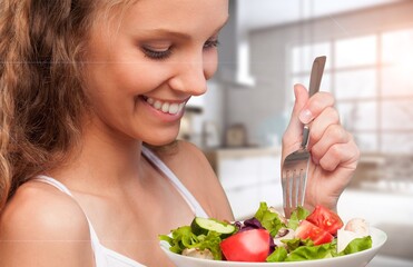 Wall Mural - Healthy Meal. Happy Woman Eating Fresh Salad