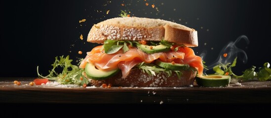 Leinwandbilder - Close-up of a delicious sandwich filled with salmon, creamy avocado, and crisp lettuce. with copy space image. Place for adding text or design