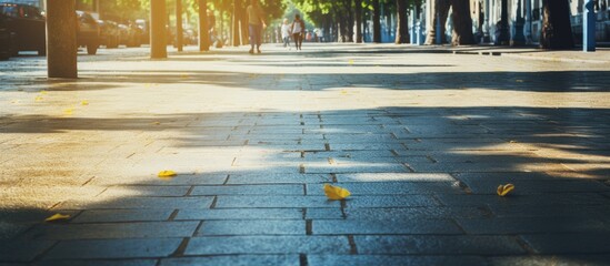 Aufkleber - A vehicle is parked next to a sidewalk covered with fallen leaves, capturing a serene autumn scene. with copy space image. Place for adding text or design