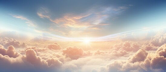 Fototapete - Sky displaying the bright sun peeking through fluffy clouds, creating a beautiful sunrise scene with radiant rays of light. with copy space image. Place for adding text or design