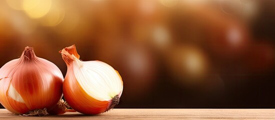 Wall Mural - Ripe onion bulbs close-up creating a fresh agriculture and farming backdrop. with copy space image. Place for adding text or design