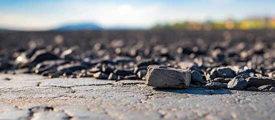 Aufkleber - A small rock is situated near a collection of larger rocks on the ground. with copy space image. Place for adding text or design
