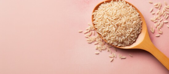 Aufkleber - Wooden spoon filled with rice placed on a pink tabletop. Long grain rice in heart-shaped spoon in a flat lay arrangement. with copy space image. Place for adding text or design