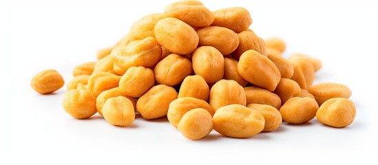 Fototapete - Pile of peanuts seen up close on a clean white table, showcasing their texture and color. with copy space image. Place for adding text or design