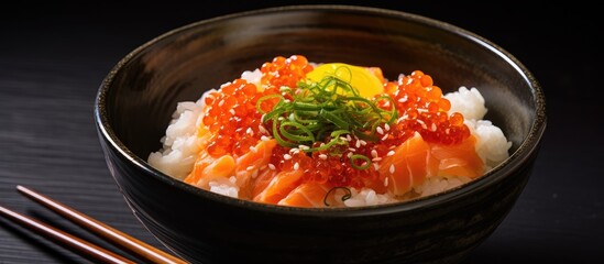 Leinwandbilder - Delicious seafood rice bowl featuring salmon, crab, and salmon roe served in a bowl. with copy space image. Place for adding text or design