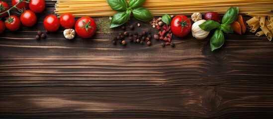 Fototapete - Pasta, fresh tomatoes, basil leaves, and various spices arranged on a table in a close-up view for a flavorful meal preparation. with copy space image. Place for adding text or design