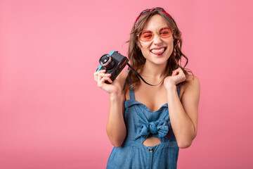 Wall Mural - attractive smiling happy woman posing with vintage photo camera