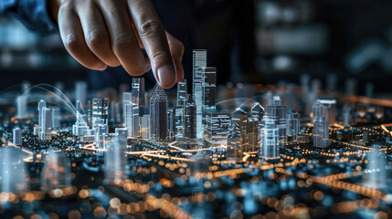 A hand hovers over a digital model of a city, interacting with the virtual cityscape
