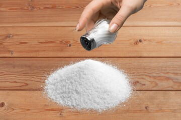 Poster - White Salt pile on a wooden table