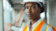 © GMeta - Black Female Engineer Wearing Hard Hat and Safety Vest