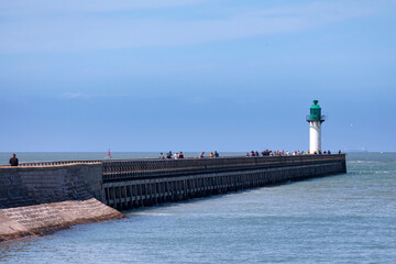 Wall Mural - The navigation lighthouse at the end of the west jetty in Calais