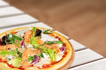 Sticker - Fresh tasty pizza dish on the desk