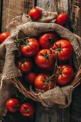 Wall Mural - Fresh red tomatoes in a wicker basket on an ancient wooden table. Juicy cherry tomatoes with dampness on a burlap-covered gray table. In rustic style.