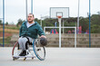 © Vergani Fotografia - person in wheelchair dribbling the ball in basketball court outdoor