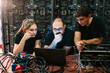 © Ezequiel Giménez/Stocksy - Group of colleagues working with a laptop
