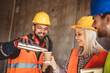© Mediteraneo - Three constructions workers having a coffee break at construction site
