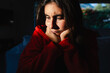 © Luis Herrera/Stocksy - Portrait of a Depressed and Bored Young Adult Woman