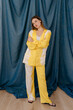 © Tania Cervian/Stocksy - Young woman wearing pajama set