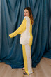 © Tania Cervian/Stocksy - Stylish woman in pajama set