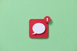 © Marc Tran/Stocksy - message speech bubbles icon on social media with number one notice