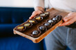 © ByLorena/Stocksy - Artisan chocolate tray