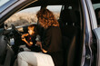 © Irina Polonina/Stocksy - Mother and Child Enjoying Sunset Drive