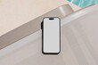 © Artem Podrez/Stocksy - Mockup Smartphone with white screen at Sunny Poolside