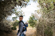 © Serena Burroughs/Stocksy - young father hiking in san diego california with son in baby carrier