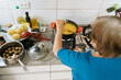 © Mal de Ojo Studio/Stocksy - Senior Cooking Traditional Meal in Kitchen