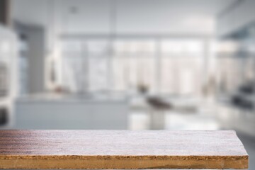 Poster - Empty beautiful table top and blur modern kitchen