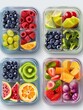 © vefimov - Four plastic containers filled with various fruits