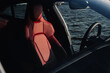 © Oleksandr Stalovierov/Stocksy - Sport car interior.
