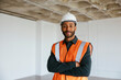 © BONNINSTUDIO/Stocksy - Confident architect in uniform examining building site