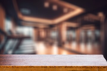 Poster - Empty wooden table top on Exercise room background