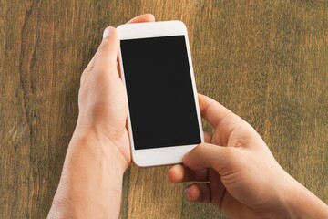 Poster - Hand hold a smartphone with a blank screen