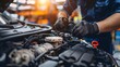 © Mr image - 3. In a well-lit workshop, an auto technician conducts a diagnostic test on a vehicle's fuel injection system, utilizing advanced equipment to pinpoint any issues and determine the necessary repairs